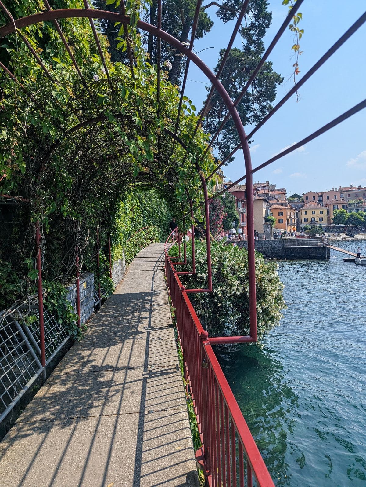 Lakeside walkway under a vine arbor in Varenna, Lake Como